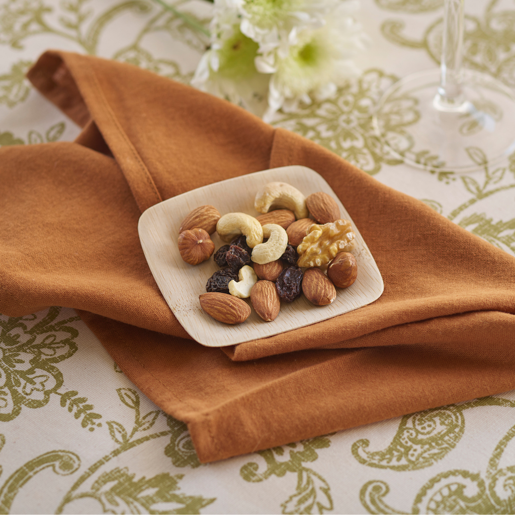 Organic Bamboo Tasting Plate shown with Peanuts