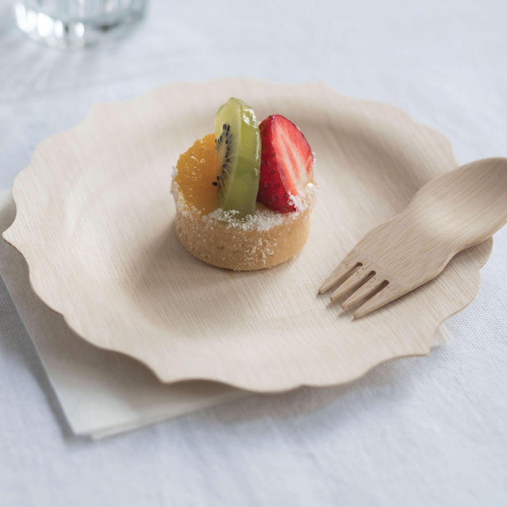 Organic Bamboo Spork shown with Fancy Round Bamboo Plate