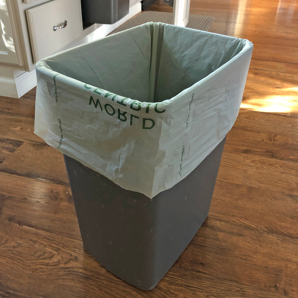 World Centric Compostable Tall Kitchen Garbage bag, shown in garbage can