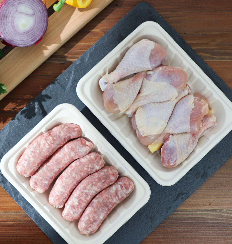 World Centric Compostable Fiber Meat and Product Tray 8P shown with food